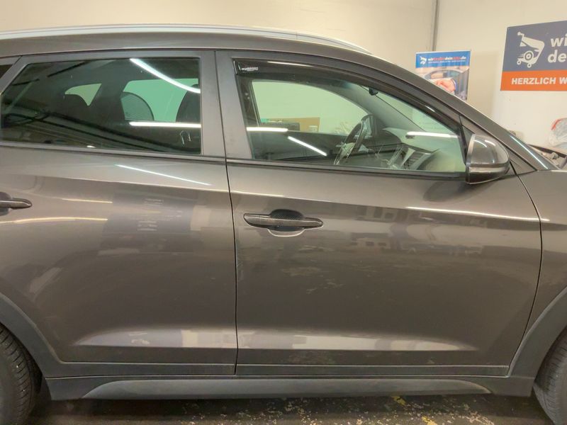 Hyundai Tucson 1.6 Advantage blue 2WD — zdjęcie 7