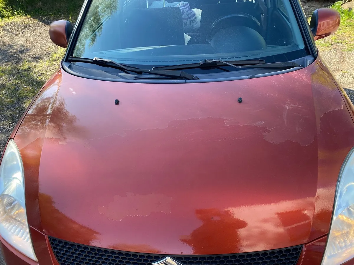 SUZUKI Swift 1.3 4WD — zdjęcie 12