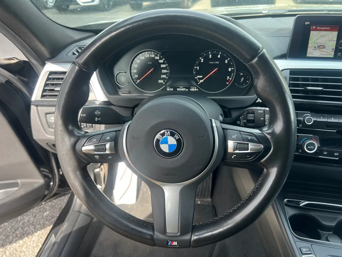 BMW 320i xDrive — zdjęcie 15