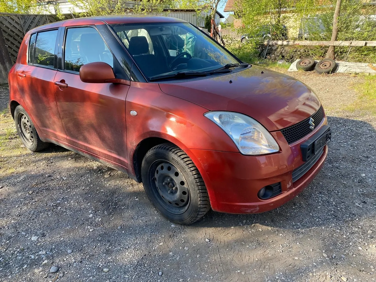 SUZUKI Swift 1.3 4WD — zdjęcie 6