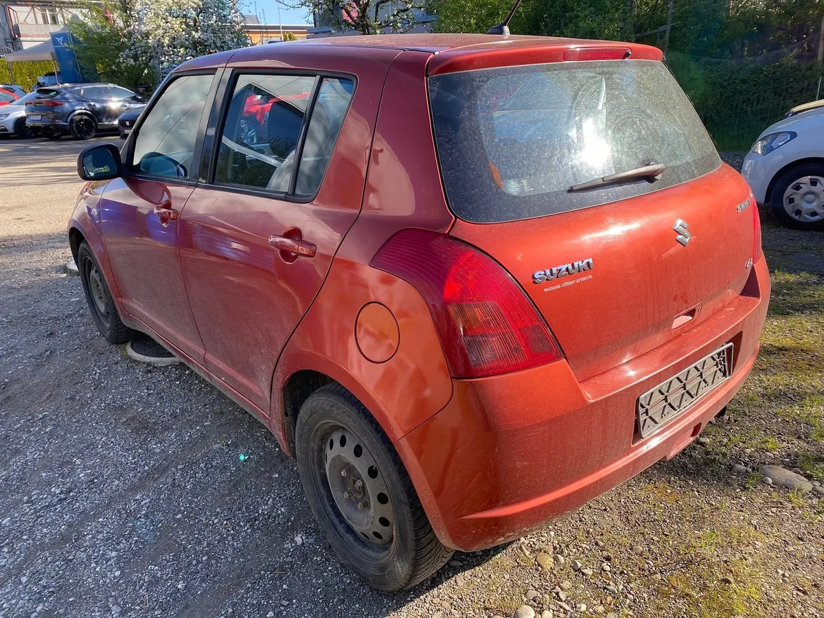 SUZUKI Swift 1.3 4WD — zdjęcie 4