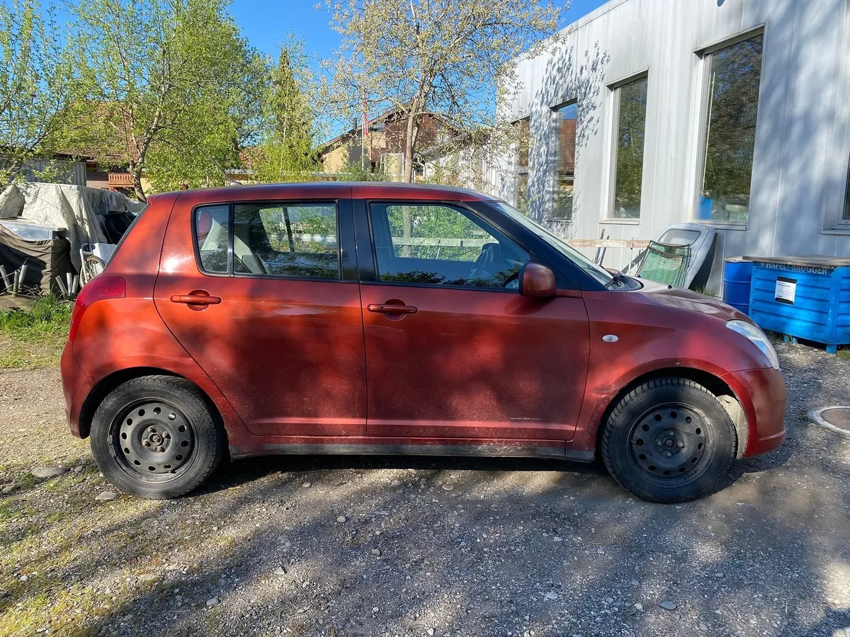 SUZUKI Swift 1.3 4WD — zdjęcie 5